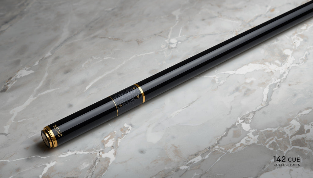 142 Collection’s 10K Black Gold Pool Cue on luxury marble surface